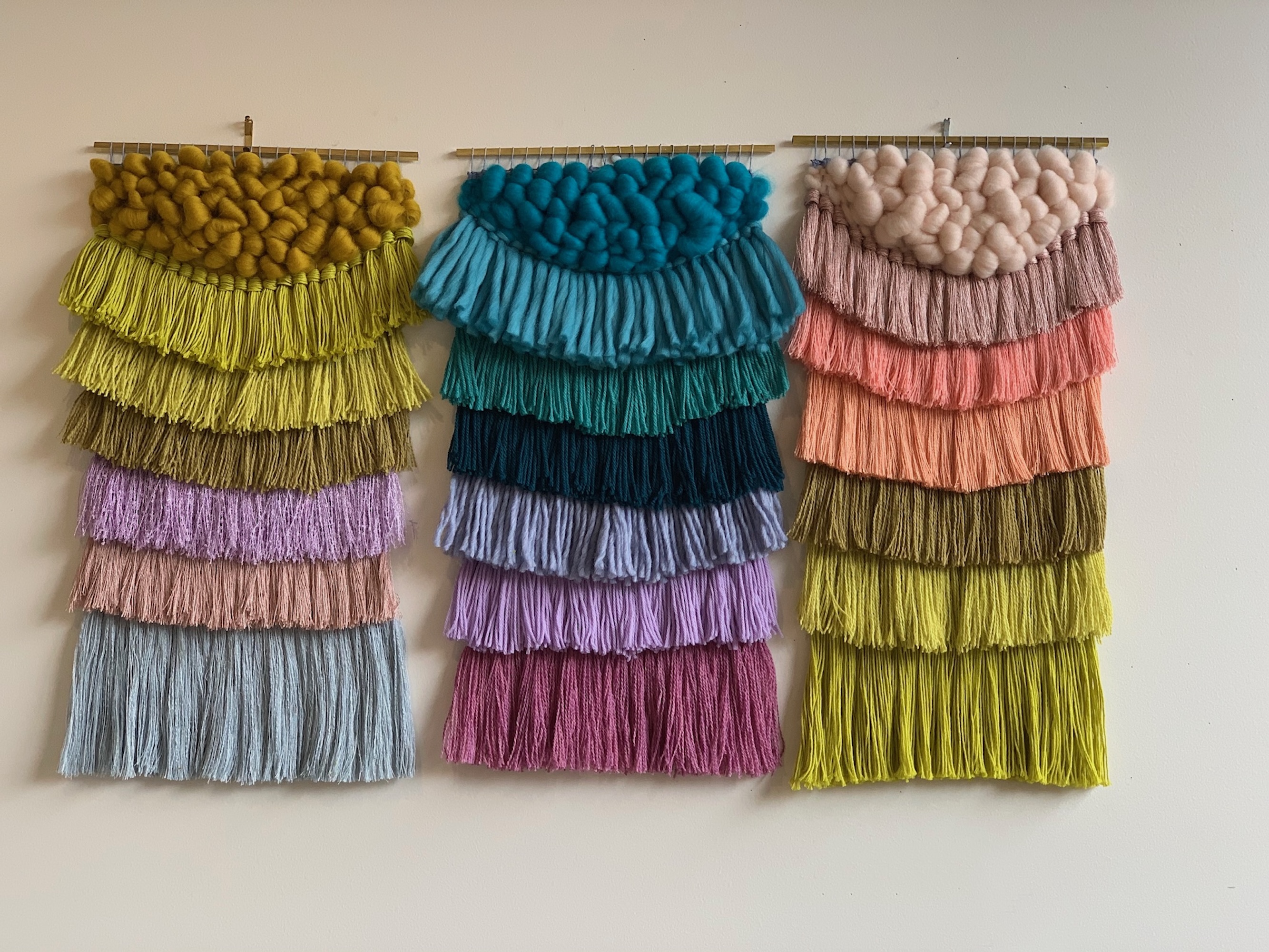 Small scale colourful weaving installation pieces 