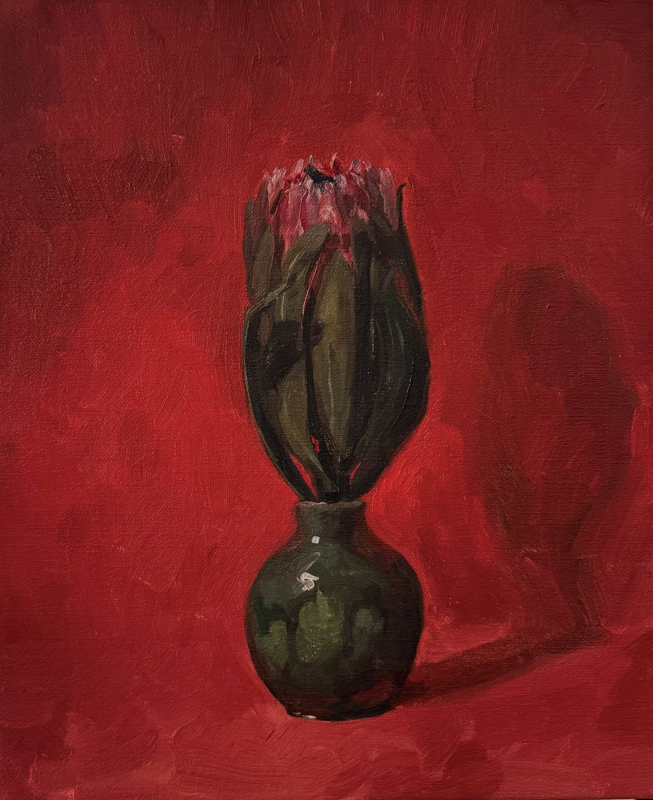 Red oil artwork with protea flower in pot in foreground 
